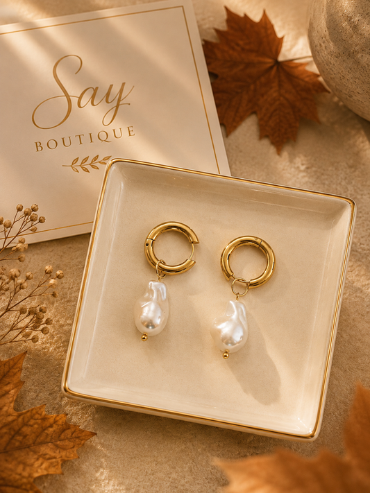Aretes dorados con perlas